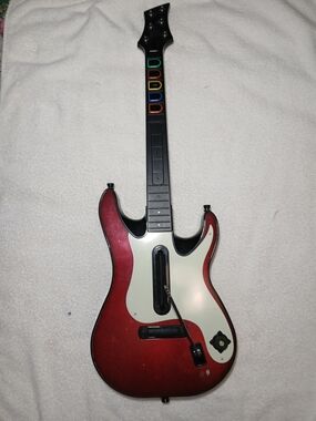 Guitar Hero 5 WirelessController Also Known as "Red Octane" or Cherry.